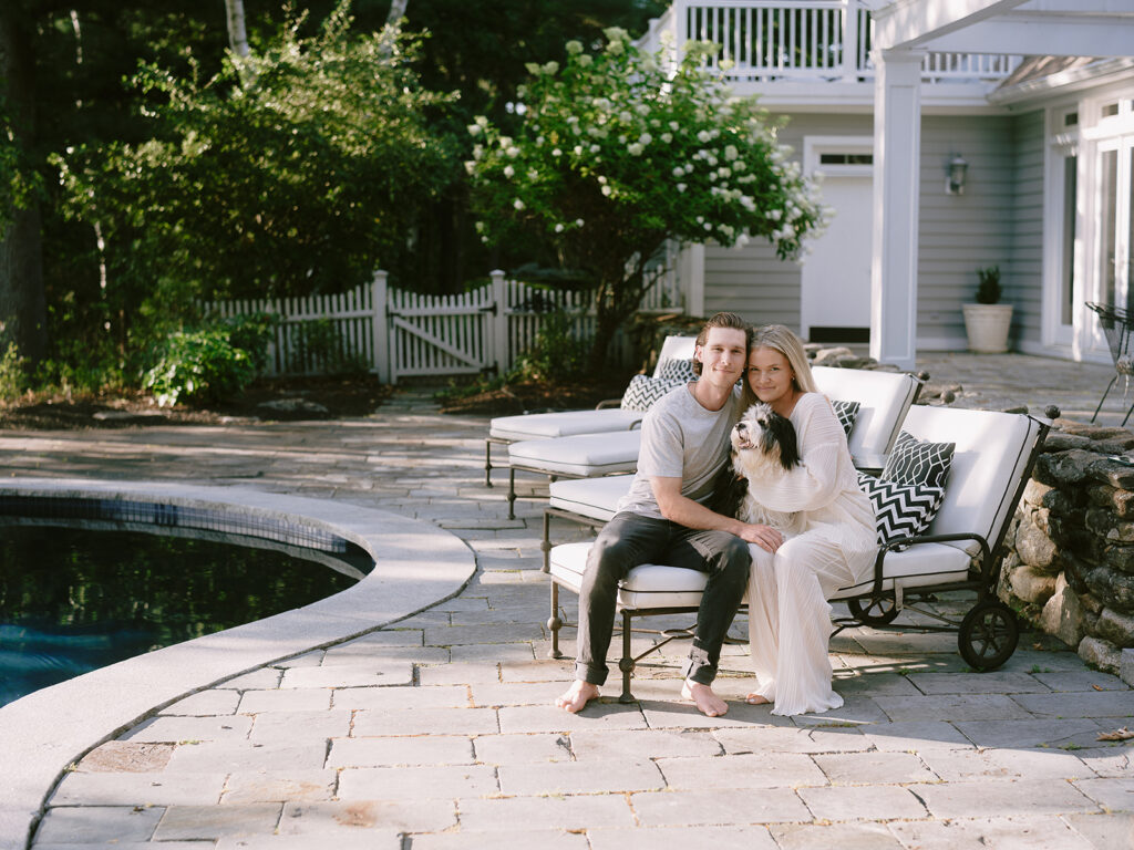 A couple looking great during their backyard engagement photo session